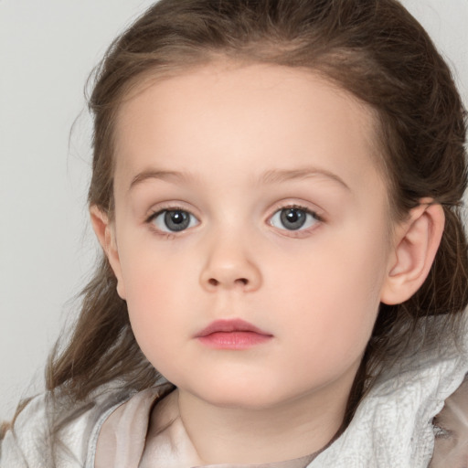 Neutral white child female with medium  brown hair and brown eyes