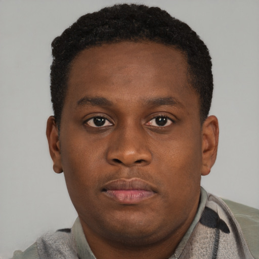 Neutral black young-adult male with short  brown hair and brown eyes