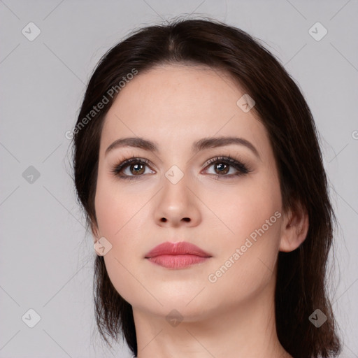 Neutral white young-adult female with medium  brown hair and brown eyes