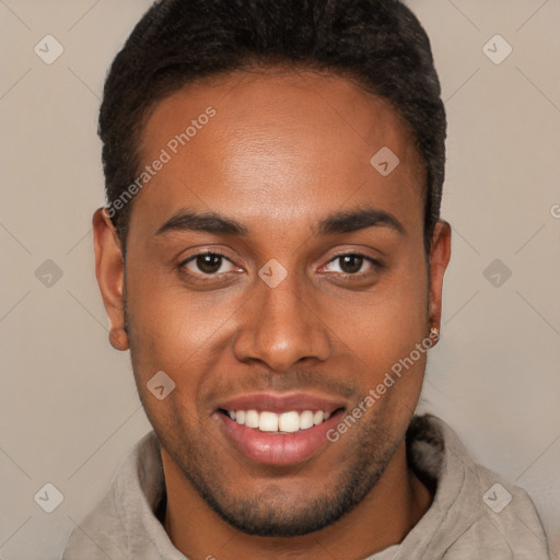 Joyful black young-adult male with short  brown hair and brown eyes