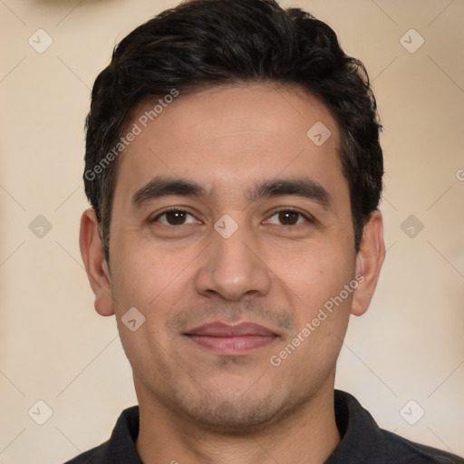 Joyful white young-adult male with short  black hair and brown eyes