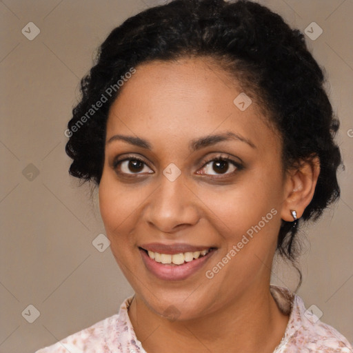 Joyful black young-adult female with medium  black hair and brown eyes