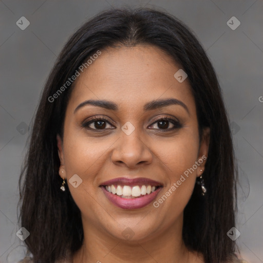 Joyful latino young-adult female with long  brown hair and brown eyes