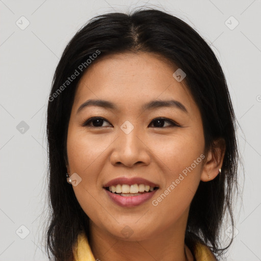 Joyful asian young-adult female with long  brown hair and brown eyes