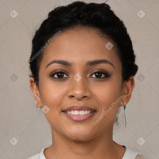 Joyful latino young-adult female with short  black hair and brown eyes