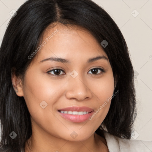 Joyful latino young-adult female with long  brown hair and brown eyes