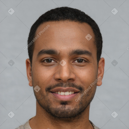 Joyful latino young-adult male with short  black hair and brown eyes