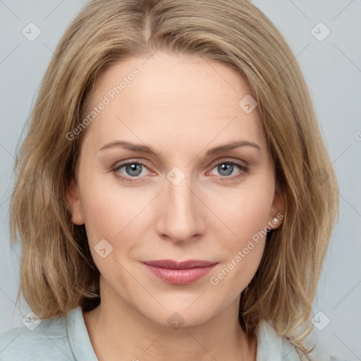 Joyful white young-adult female with medium  brown hair and blue eyes