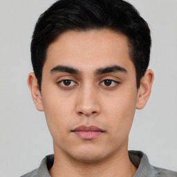 Neutral asian young-adult male with short  black hair and brown eyes