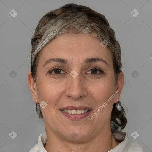 Joyful white adult female with short  brown hair and brown eyes