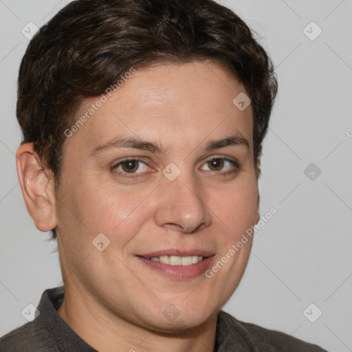 Joyful white adult male with short  brown hair and grey eyes