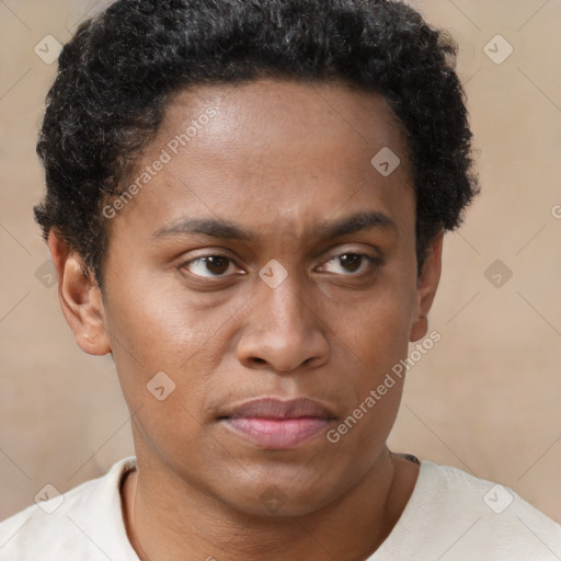 Joyful black young-adult male with short  brown hair and brown eyes