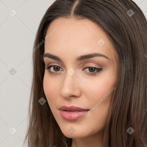 Neutral white young-adult female with long  brown hair and brown eyes