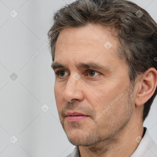 Neutral white adult male with short  brown hair and brown eyes
