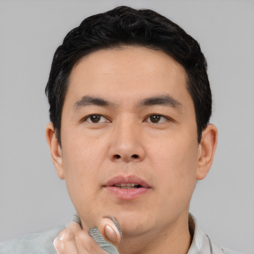 Neutral asian young-adult male with short  black hair and brown eyes
