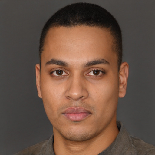Neutral latino young-adult male with short  brown hair and brown eyes
