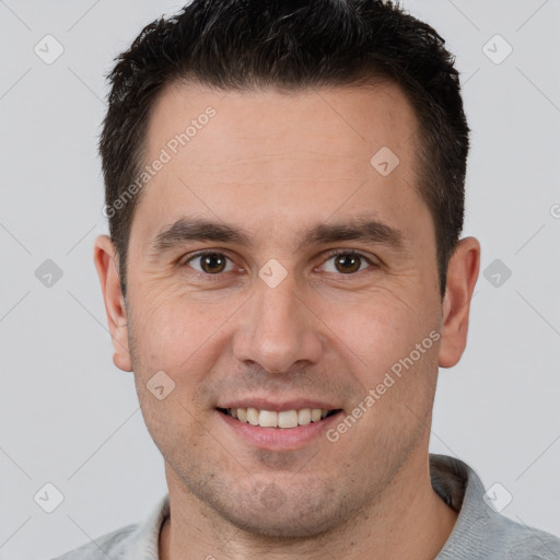 Joyful white young-adult male with short  brown hair and brown eyes