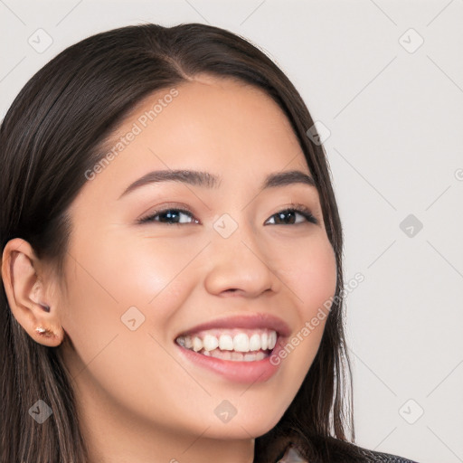 Joyful white young-adult female with long  brown hair and brown eyes