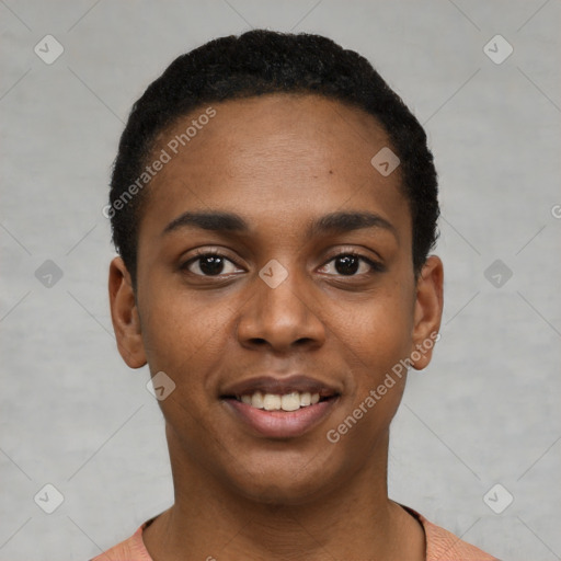 Joyful black young-adult female with short  black hair and brown eyes