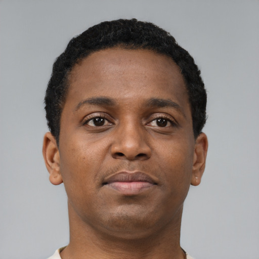 Neutral black young-adult male with short  brown hair and brown eyes