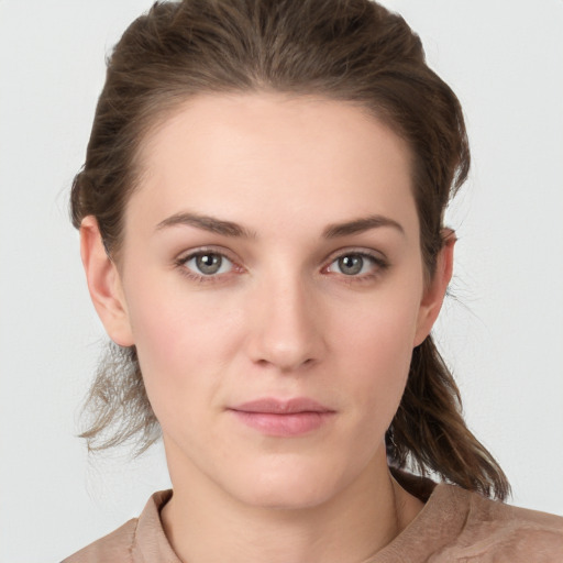 Neutral white young-adult female with medium  brown hair and grey eyes