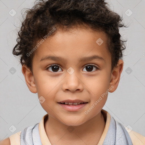 Joyful white child male with short  brown hair and brown eyes