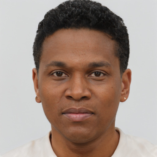 Neutral black young-adult male with short  black hair and brown eyes