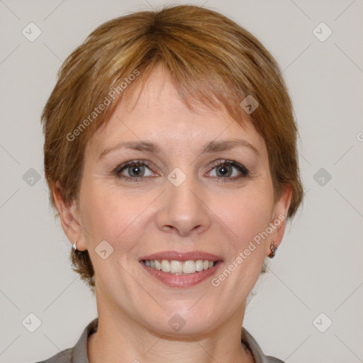 Joyful white adult female with medium  brown hair and grey eyes