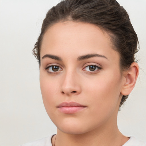 Neutral white young-adult female with medium  brown hair and brown eyes