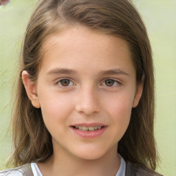 Joyful white child female with long  brown hair and brown eyes