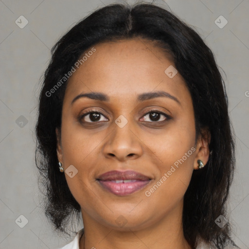 Joyful latino young-adult female with medium  brown hair and brown eyes