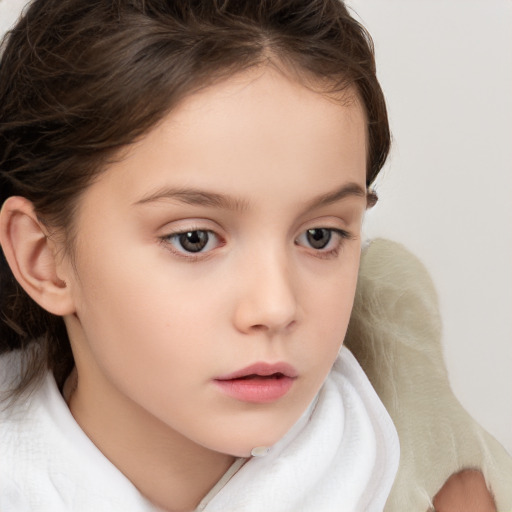 Neutral white child female with medium  brown hair and brown eyes