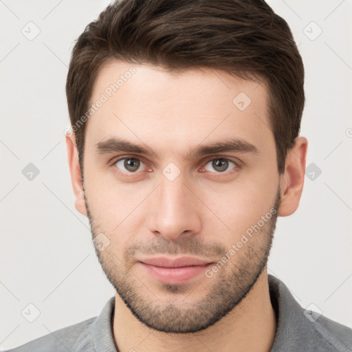 Neutral white young-adult male with short  brown hair and brown eyes