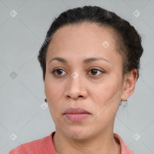 Neutral white young-adult female with short  brown hair and brown eyes