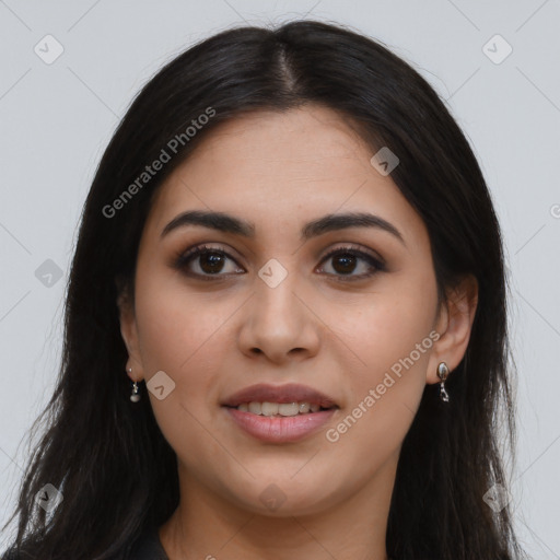 Joyful latino young-adult female with long  brown hair and brown eyes