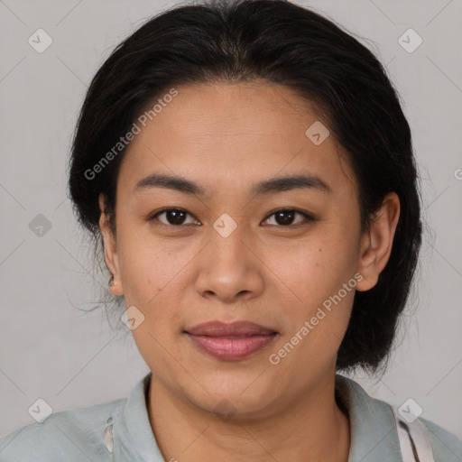 Joyful latino young-adult female with medium  brown hair and brown eyes