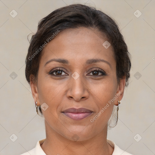 Joyful white adult female with short  brown hair and brown eyes