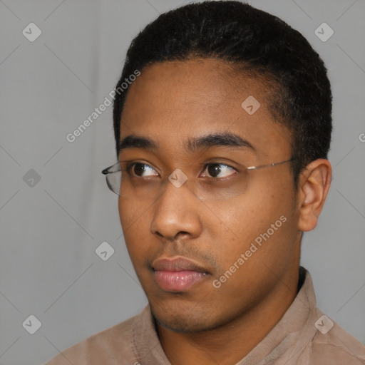 Neutral black young-adult male with short  black hair and brown eyes