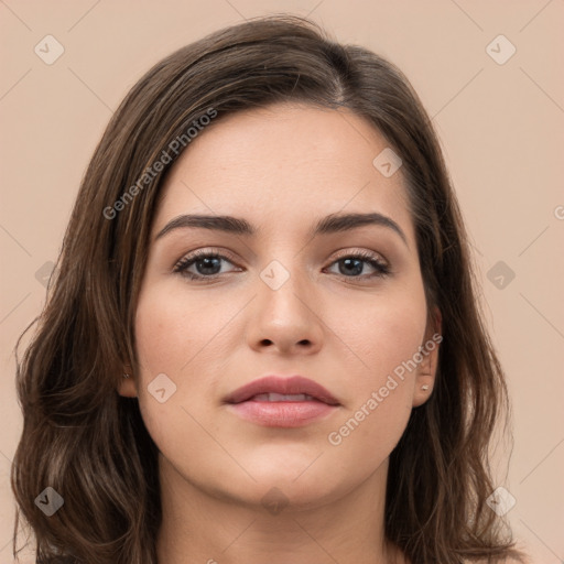 Neutral white young-adult female with long  brown hair and brown eyes