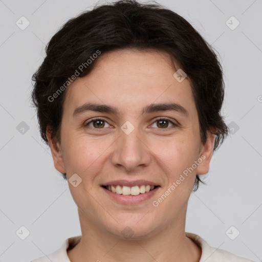 Joyful white young-adult female with short  brown hair and brown eyes