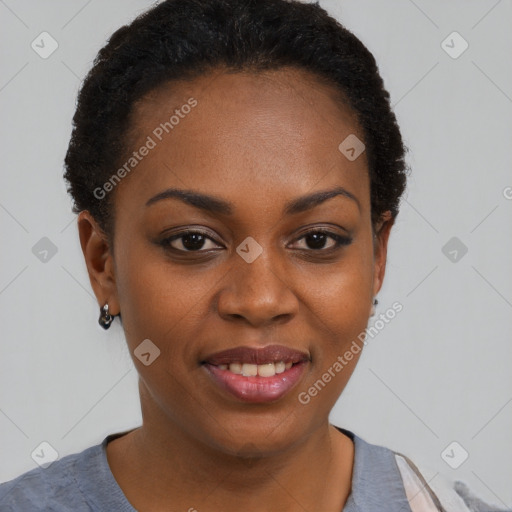 Joyful black young-adult female with short  brown hair and brown eyes