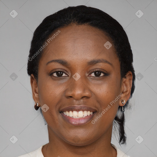 Joyful black young-adult female with medium  black hair and brown eyes