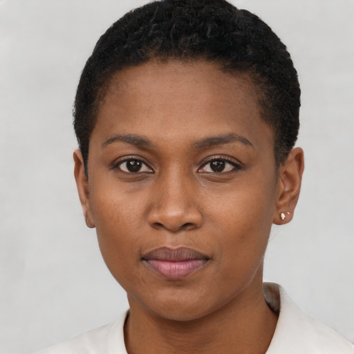 Neutral black young-adult female with short  black hair and brown eyes