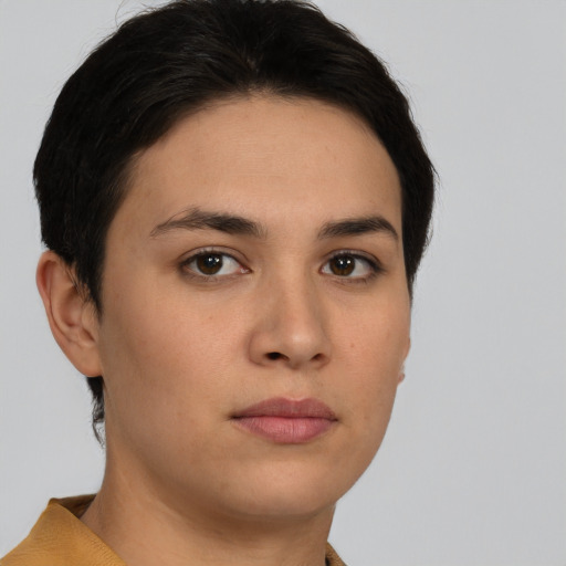 Neutral white young-adult female with short  brown hair and brown eyes