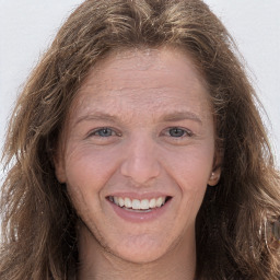 Joyful white young-adult female with long  brown hair and grey eyes