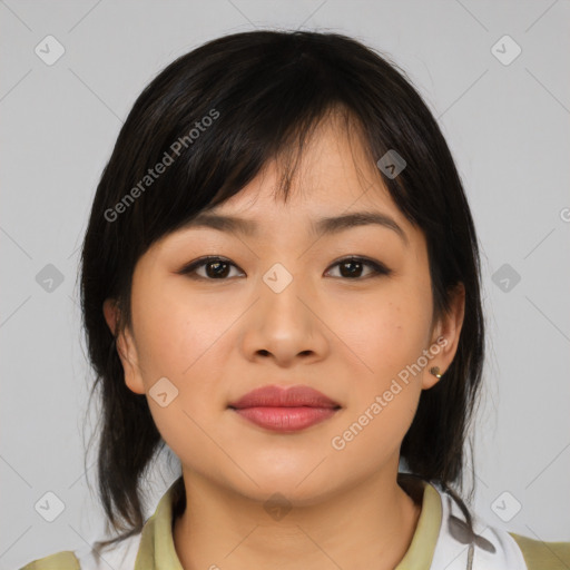 Joyful asian young-adult female with medium  brown hair and brown eyes