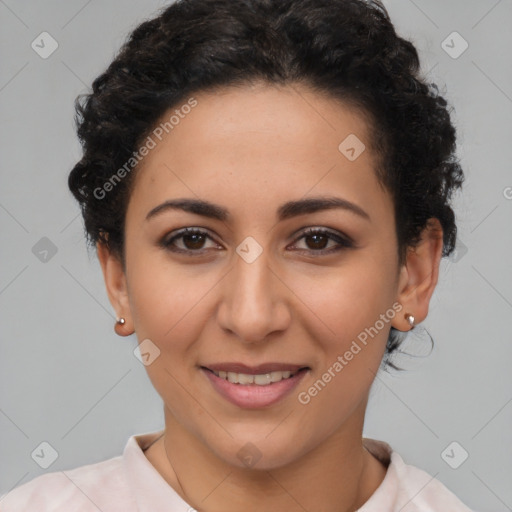 Joyful latino young-adult female with short  brown hair and brown eyes