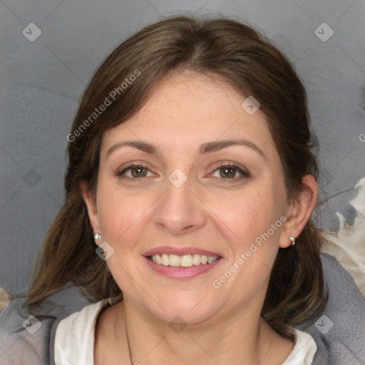 Joyful white adult female with medium  brown hair and grey eyes