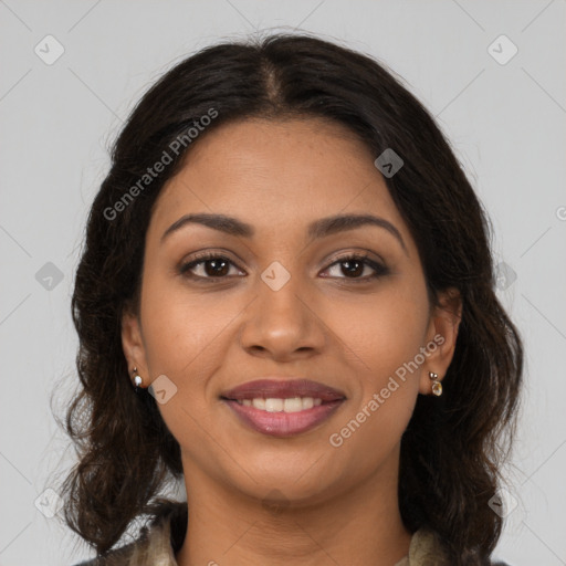 Joyful latino young-adult female with long  brown hair and brown eyes