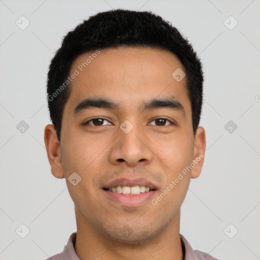 Joyful latino young-adult male with short  black hair and brown eyes